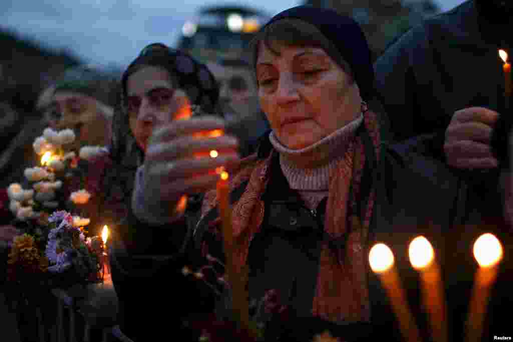 Believers attend a religious procession to commemorate "The Day of 100,000 Martyrs" in Tbilisi, Georgia.