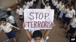 Mumbai students march for peace and condemn recent terror attacks in the city, India, July 20, 2011.