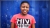 Nandi Makhele, 25, poses for a portrait while wearing a T-shirt indicating that she is HIV-positive, in Cape Town's Khayelitsha township February 15, 2010. 