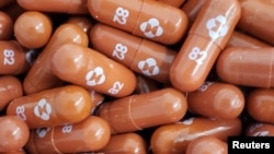 Arhiva - Pilule eksperimentalnog leka nazvanom molnupiravir za tretman protiv Kovida 19 kompanija Merk & Ko i Ridžbek Bajaterapeutiks na fotografiji kompanije Merk & Ko, 17. maja 2021.