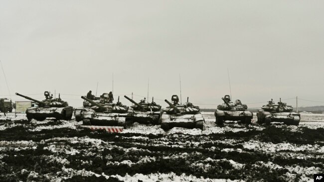 Russian tanks T-72B3 take part in drills at the Kadamovskiy firing range in the Rostov region in southern Russia, Jan. 12, 2022.
