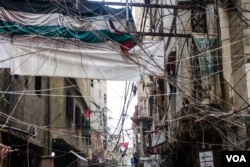 The streets of Shatila, where rates of poverty are high. It is one of twelve Palestinian refugee camps around Lebanon. (John Owens/VOA)