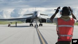 FILE - A B-1B Lancer arrives at Andersen Air Force Base, Guam, July 26, 2017, in this photo provided by the U.S.Air Force.
