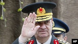 Turkey's former Chief of Staff Gen. Ilker Basbug salutes during a ceremony in Ankara, April 7, 2010.