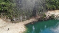 Tampak udara tebing bukit karst lokasi situs kubur prasejarah Toyali yang terdampak pembuatan jalan oleh PT. Poso Energy, Minggu, 14 Februari 2021. (Foto: Yoanes Litha)