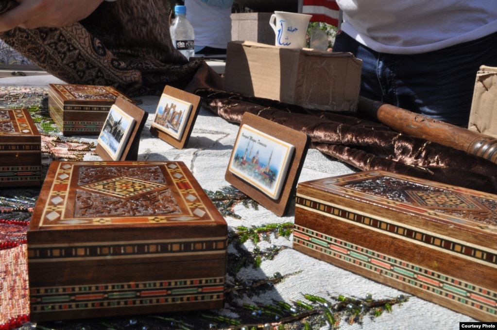 Handmade Syrian crafts are sold by Syriana, a D.C.-based store that ships merchandise from the handicraft markets in Damascus, during Syria Fest in Washington, Sept. 3, 2017. (Photo courtesy of Rabah Seba)