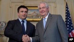 U.S. Secretary of State Tillerson shakes hands with Ukrainian Foreign Minister Pavlo Klimkin at the State Department in Washington, March 7, 2017.