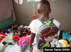 A little boy who’d been raped observes sleeping classmates at his crèche in Diepsloot, a violent Johannesburg settlement.