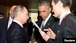 Президенты Владимир Путин и Барак Обама