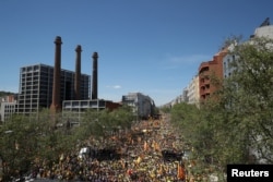 Pro-independence supporters march as they attend a demonstration in Barcelona, Spain, April 15, 2018.