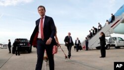 Eric Trump steps off Air Force One as he arrives, April 16, 2017, at Andrews Air Force Base near Washington, D.C., as President Donald Trump and his family return from his Florida Mar-a-Largo resort.