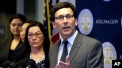 Washington State Attorney General Bob Ferguson speaks at a news conference about the state's response to President Trump's revised travel ban in Seattle, March 9, 2017.