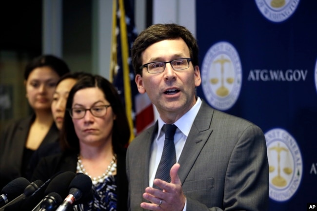 FILE - Washington State Attorney General Bob Ferguson speaks at a news conference about the state's response to President Trump's revised travel ban in Seattle, March 9, 2017.