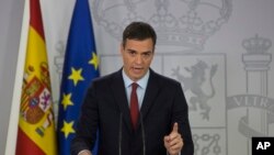 Spain's Prime Minister Pedro Sanchez delivers a speech at the Moncloa Palace in Madrid, Spain, Saturday, Nov. 24, 2018. 