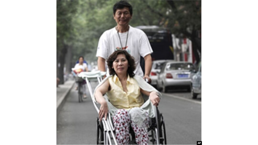 中國殘疾人律師倪玉蘭與丈夫董繼勤(資料圖片)