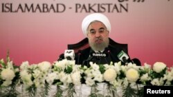 ປະທານາທິບໍດີ ອີຣ່ານ ທ່ານ Hassan Rouhani ຖະແຫລງໃນລະຫວ່າງ ກອງປະຊຸມນັກຂ່າວ ໃນນະ
ຄອນຫຼວງອິສລາມາບັດ, ປະເທດປາກິສຖານ, ວັນ
ທີ 26 ມີນາ 2016.