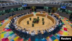 EU leaders take part in a European Union summit in Brussels, June 28, 2018.