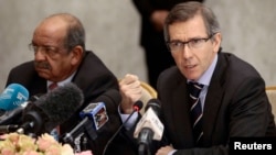 Bernardino Leon, right, the U.N. special envoy for a Libya, addresses Libyan political leaders and rivals in Algiers Tuesday. At left is Algeria's Minister of African and Maghreb Affairs, Abdelkader Messahel, March 10, 2015. 