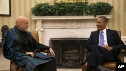 Predsednici Avganistana, Hamid Karzai, i Sjedinjenih Država, Barak Obama, tokom razgovora u Beloj kući, 11. januar 2013.