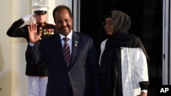 Hassan Sheikh Mohamud, President of of Somalia and his wife Qamar Ali Omar arrive for a dinner hosted by President Barack Obama for the U.S. Africa Leaders Summit, Tuesday, Aug. 5, 2014. African heads of state are gathering in Washington for an unprecedented summit to promote business development. (AP Photo/Susan Walsh)