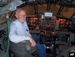 Volunteer Bob Hood in the Comet's restored cockpit.