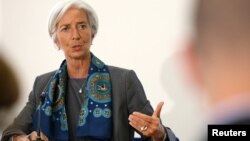 IMF Managing Director Christine Lagarde prepares to host a news conference at the Treasury in London, June 6, 2014.