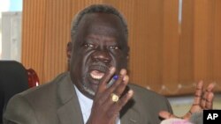 South Sudan Minister of Health Dr. Riek Gai Kok speaks during a press conference in Juba, South Sudan, June 2, 2017. South Sudan's government says 15 young children have died in a botched measles vaccination campaign that saw people as young as 12 years 