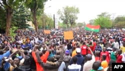 By police estimates, some 10,000 people take part in a protest on Nation Square, Ouagadougou, Jan. 18, 2014.