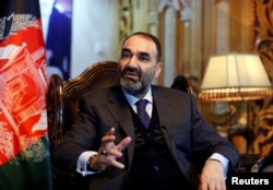 FILE - Atta Mohammad Noor, governor of Balkh province, speaks during an interview in Kabul, Afghanistan, Jan. 25, 2017.