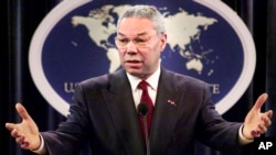 FILE - In this May 21, 2001, file photo, Secretary of State Colin Powell talks with reporters during a news conference at the Department of State in Washington. Powell, former Joint Chiefs chairman and secretary of state, has died from COVID-19 complicati