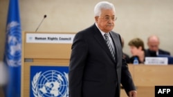 Palestinian President Mahmud Abbas arrives to delivers a speech during the United Nations Human Rights Council on Feb. 27, 2017 in Geneva.