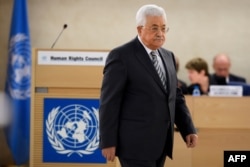 Palestinian President Mahmud Abbas arrives to delivers a speech during the United Nations Human Rights Council on Feb. 27, 2017 in Geneva.