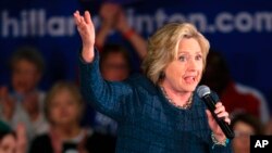 FILE - Democratic presidential candidate Hillary Clinton speaks during a campaign stop in Council Bluffs, Iowa, Jan. 5, 2016. 