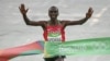 Eliud Kipchoge wa Kenya akimaliza marathon Rio de Janeiro, Brazil, Aug 21, 2016.