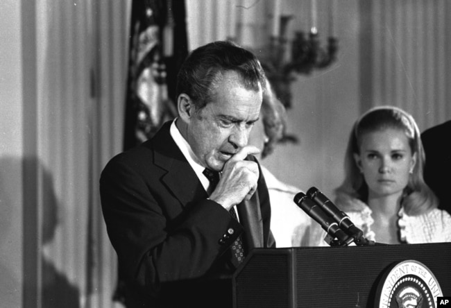 FILE - Richard Nixon bids farewell to his Cabinet, aides, and staff on August 9, 1974. (AP Photo)