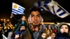 Sanctioned, Suarez Back Home in Uruguay