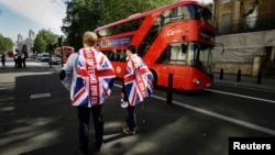 Vote leave supporters stand outside Downing Street in London after Britain voted to leave the European Union, June 24, 2016.