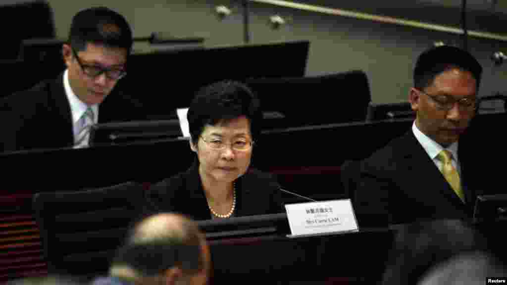 FILE - Hong Kong Chief Secretary Carrie Lam looks on during a meeting on proposing electoral reforms at the Legislative Council in Hong Kong.