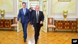 Tổng thống Nga Vladimir Putin và Tổng thống Syria Bashar Assad tại điện Kremlin ở Moscow, ngày 20/10/2015.