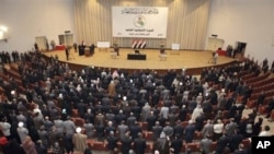 Iraqi lawmakers attend the parliament session in Baghdad, Iraq (File)