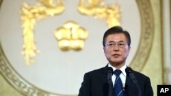 South Korean President Moon Jae-in speaks during a press conference marking his first 100 days in office at the presidential house in Seoul, Aug. 17, 2017. President Moon said Thursday he would consider sending a special envoy to North Korea for talks if the North stops its missile and nuclear tests.