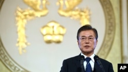 South Korean President Moon Jae-in speaks during a press conference marking his first 100 days in office at the presidential house in Seoul, Aug. 17, 2017. President Moon said Thursday he would consider sending a special envoy to North Korea for talks if 