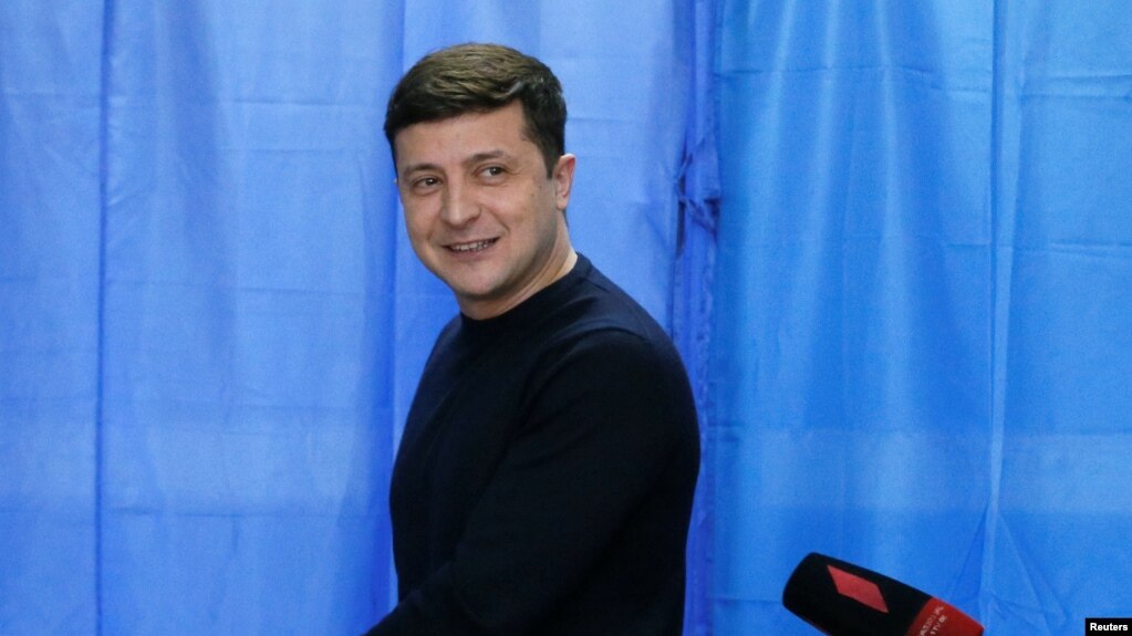 FILE - Ukrainian comic actor and presidential candidate Volodymyr Zelenskiy at a polling station during a presidential election in Kiev, Ukraine March 31, 2019. 