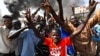 Sudanese Protesters Take to Streets After General Declares State of Emergency 