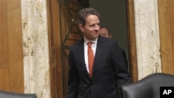 Treasury Secretary Timothy Geithner arrives on Capitol Hill in Washington to testify before the committee's hearing on the Treasury Department's fiscal 2011 budget, April 5, 2011