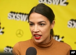 Alexandria Ocasio-Cortez arrives for the world premiere of "Knock Down the House" at the Paramount Theatre during the South by Southwest Film Festival, March 10, 2019, in Austin, Texas.