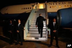 U.S. Secretary of State Rex Tillerson boards his plane to depart at the end of a five-country swing through Africa from Abuja, Nigeria, March 12, 2018.