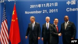 Kina bën thirrje për bashkëpunim me delegacionin amerikan