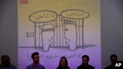 FILE - This picture taken May 17, 2018, shows members of Lebanon's pioneering LBGT advocacy group Helem or dream speak during a press conference in Beirut, Lebanon. 
