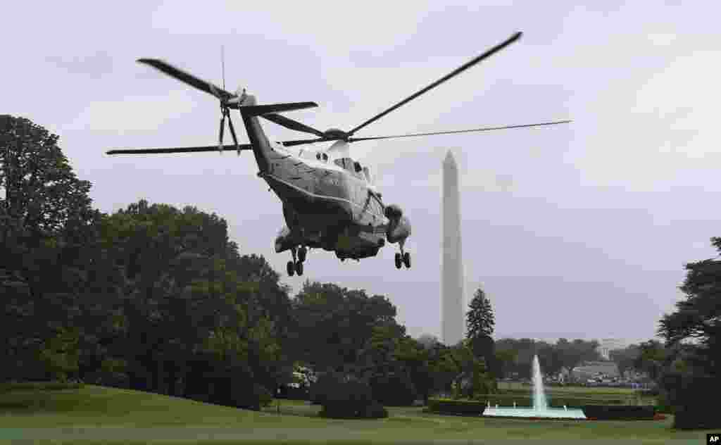 Chiếc trực thăng Marine One chở Tổng thống Obama rời khuôn viên Nhà Trắng để bay tới Căn cứ Không quân Andrews ở tiểu bang Maryland, nơi chiếc chuyên cơ Air Force One chờ sẵn, hôm 21/5.